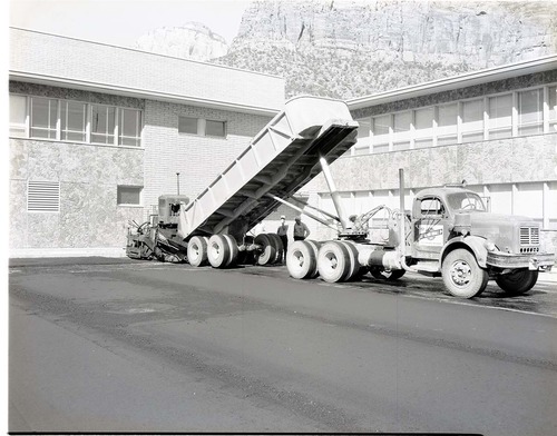 Laying of bituminous mat on roadway and employee parking area at Mission 66 Visitor Center and Museum.