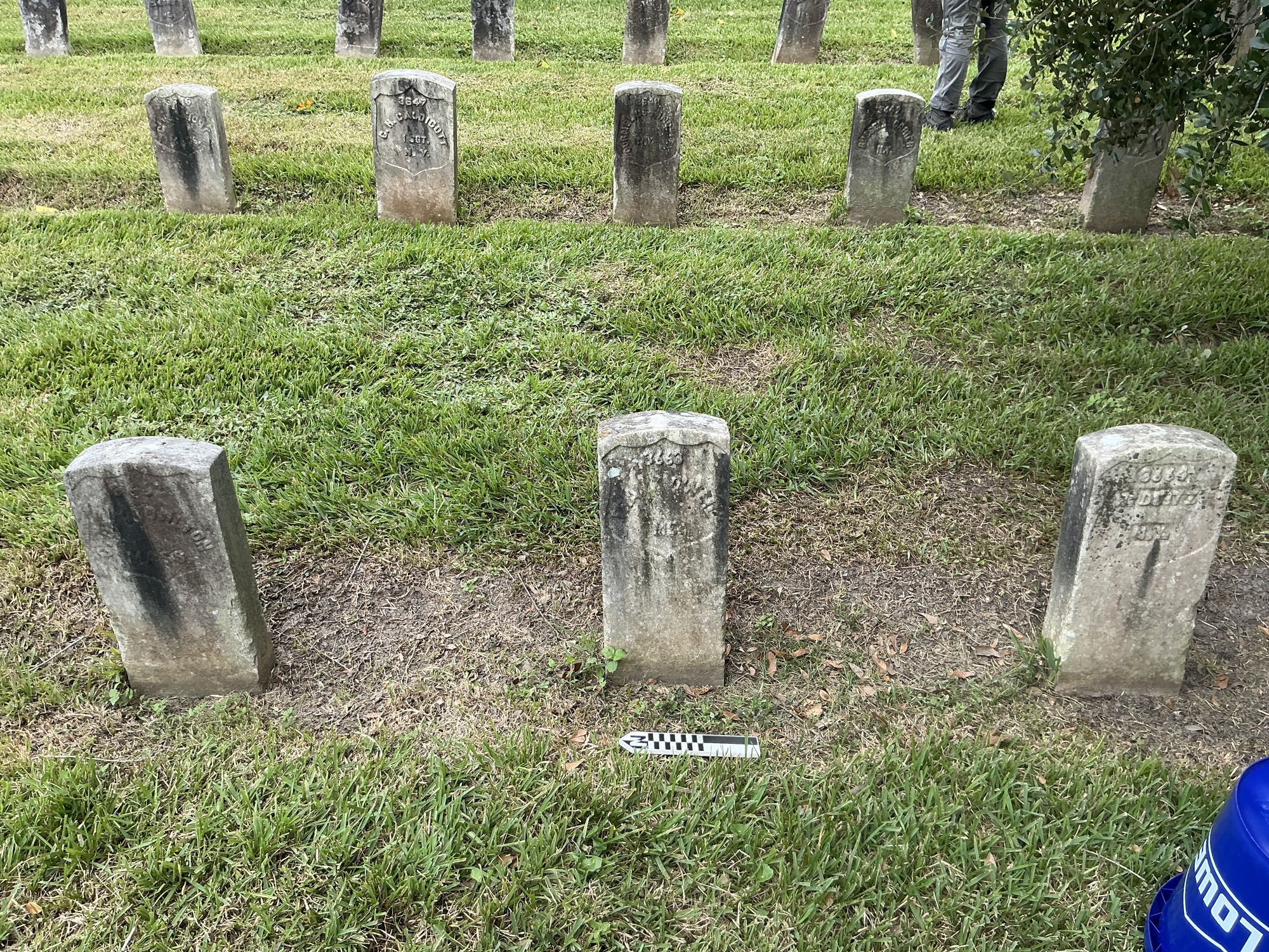 Extra image of historic upright marble headstone with recessed shield face.