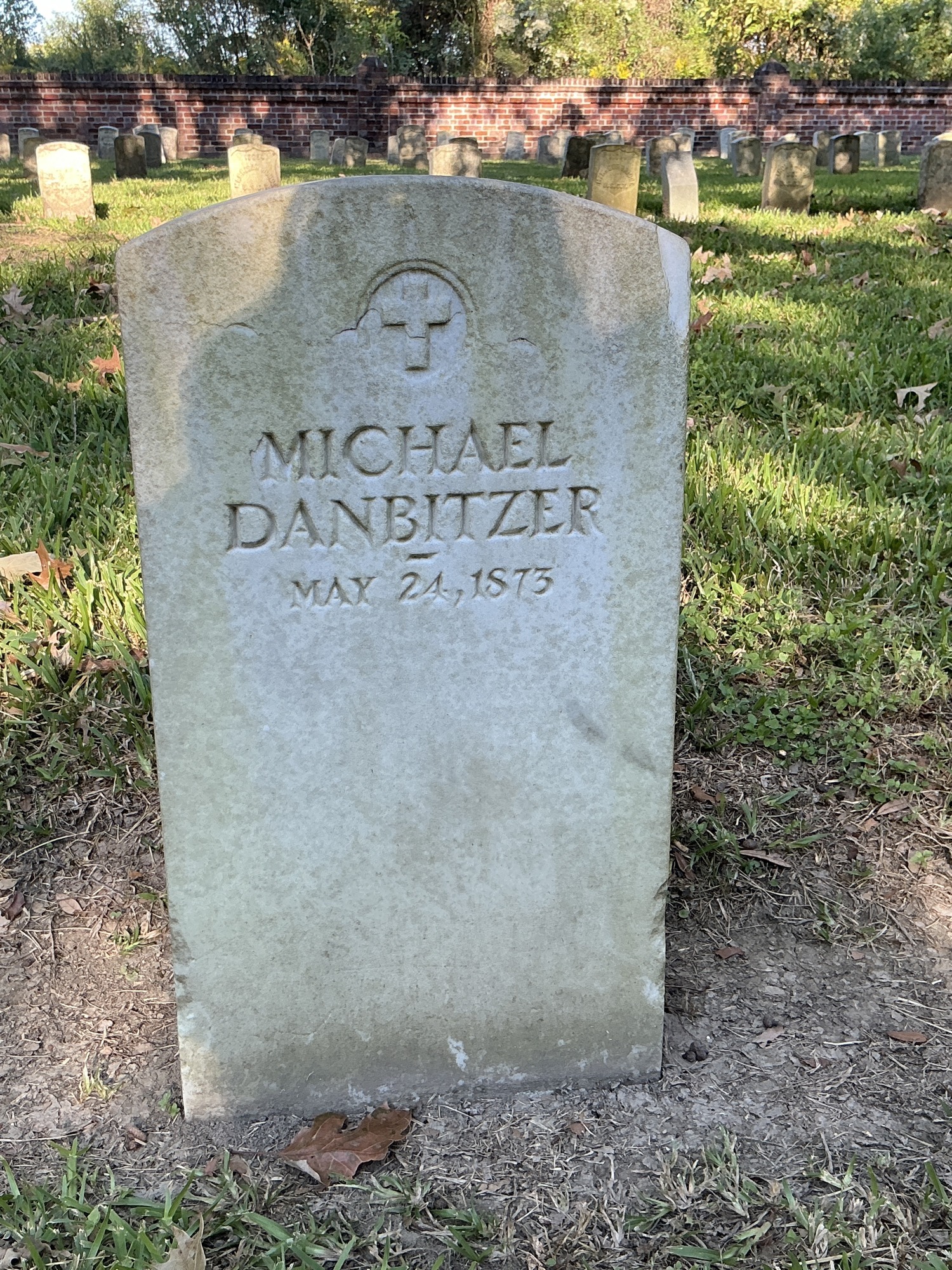 Front of upright marble headstone with flat face.