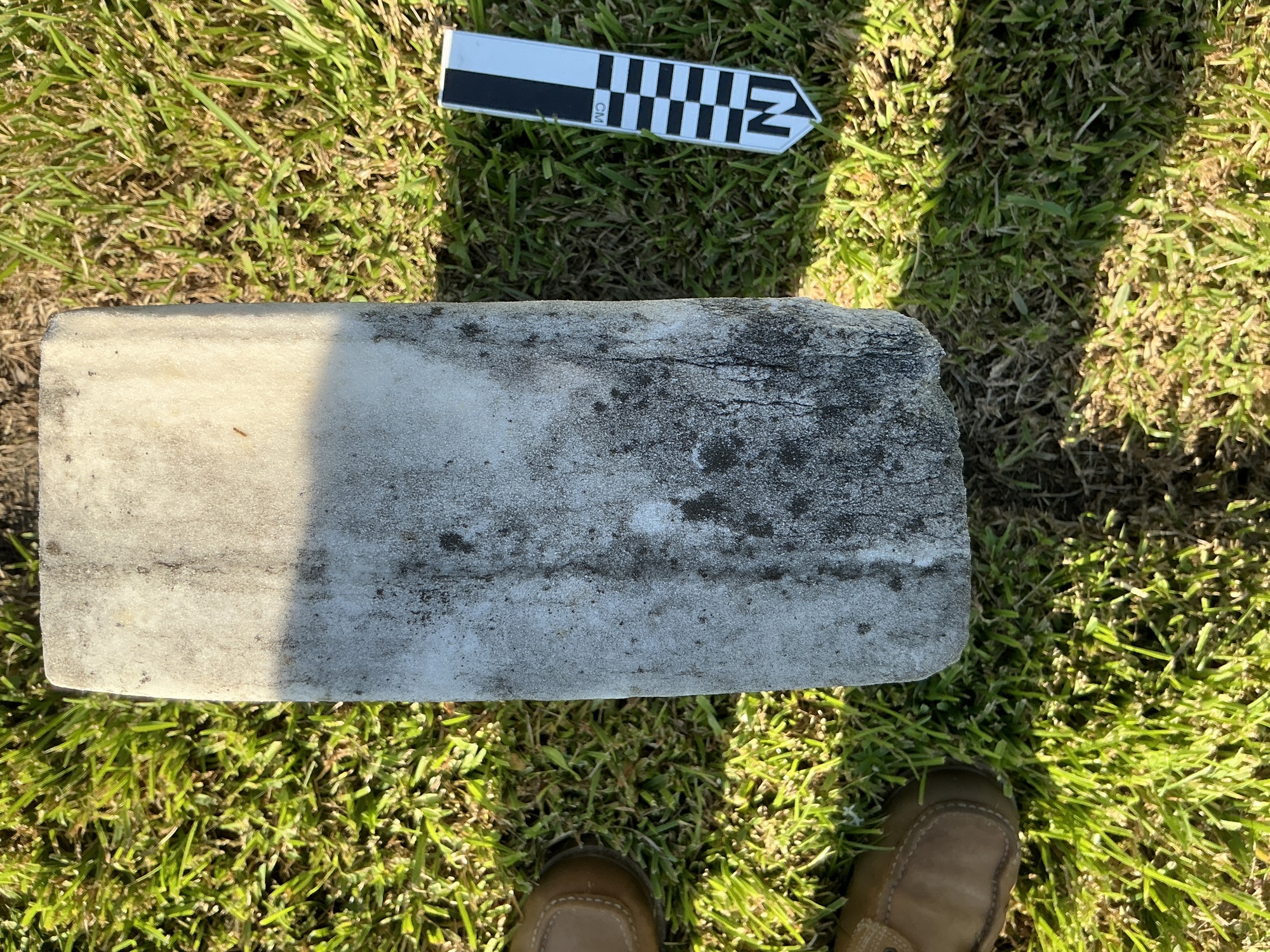 Extra image of historic upright marble headstone with recessed shield face.