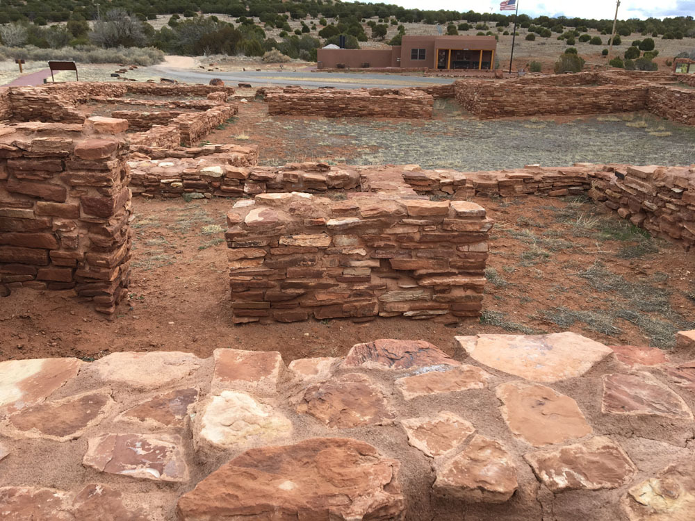 Several small, stone rooms connected with doorways
