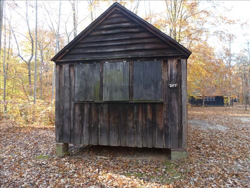 Paint/Stain Historic Structures in Cabin Camp 4