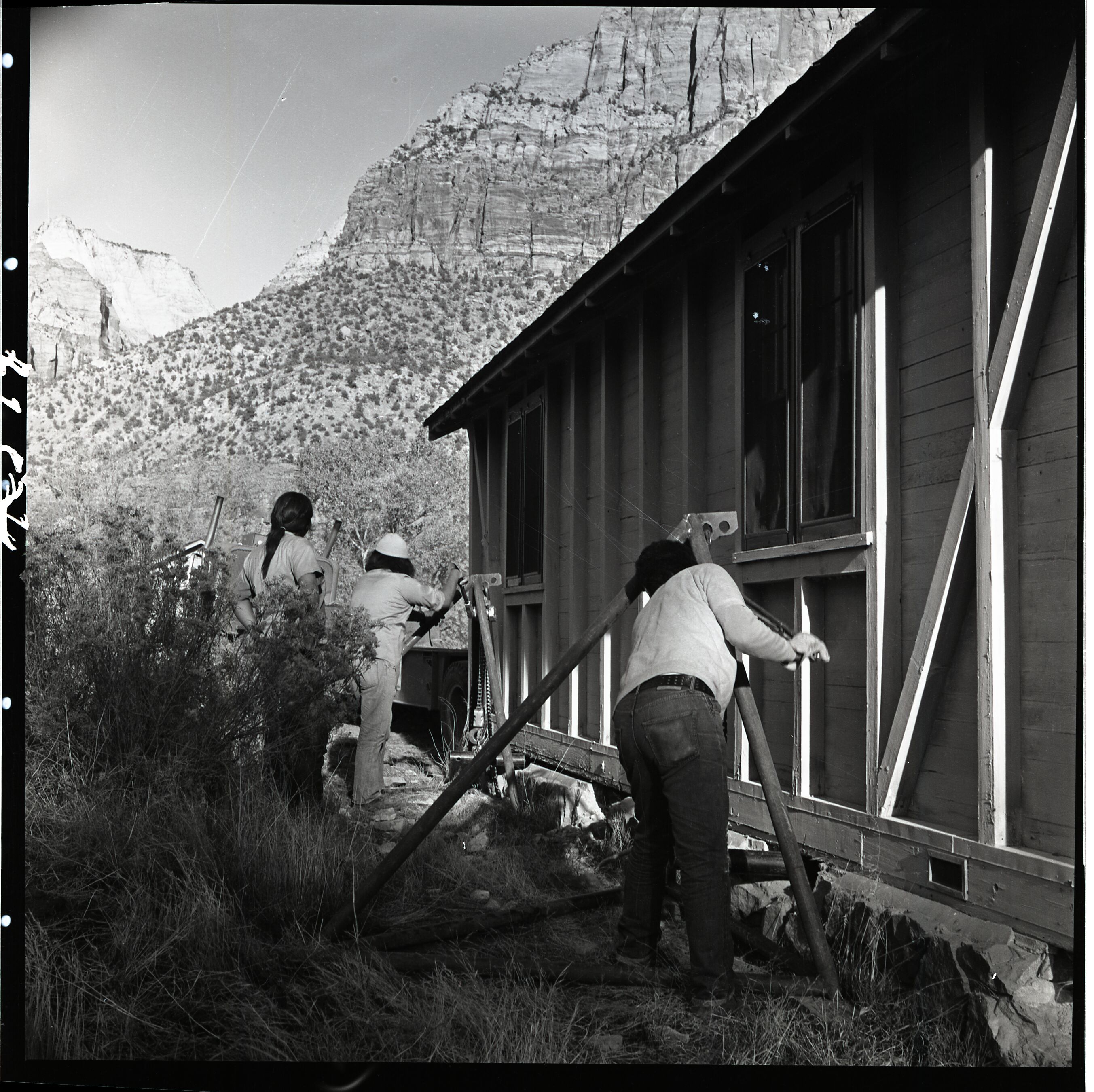 Zion Inn cabins prior to removal, Kaibab-Paiute Tribe shown removing their share of the buildings. Zion Inn near South Campground, Nature Center, and South Entrance.