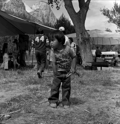Small boy, the grandson of Levan Martineau, at third Folklife Festival at Zion National Park Nature Center, September 1979.