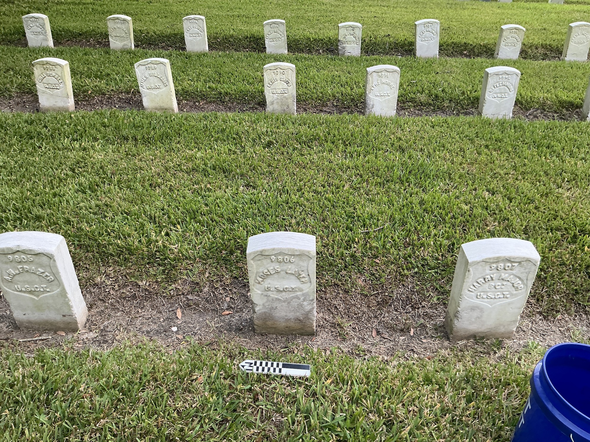 Extra image of historic upright marble headstone with recessed shield face.