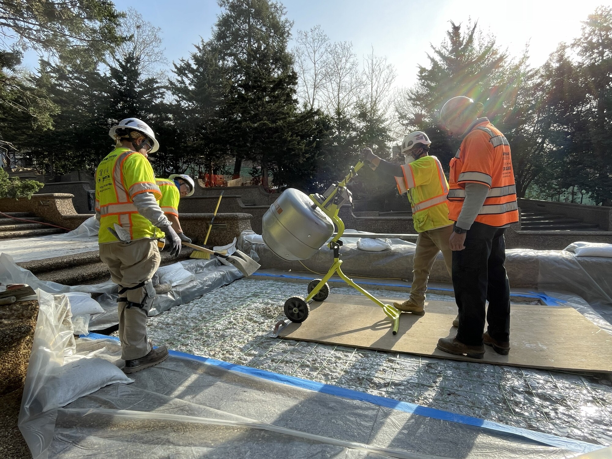 Mixing concrete aggregate for a horizontal surface along the cascade fountain at Meridian Hill Park.