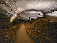 A paved trail leads thorough large cave passages.