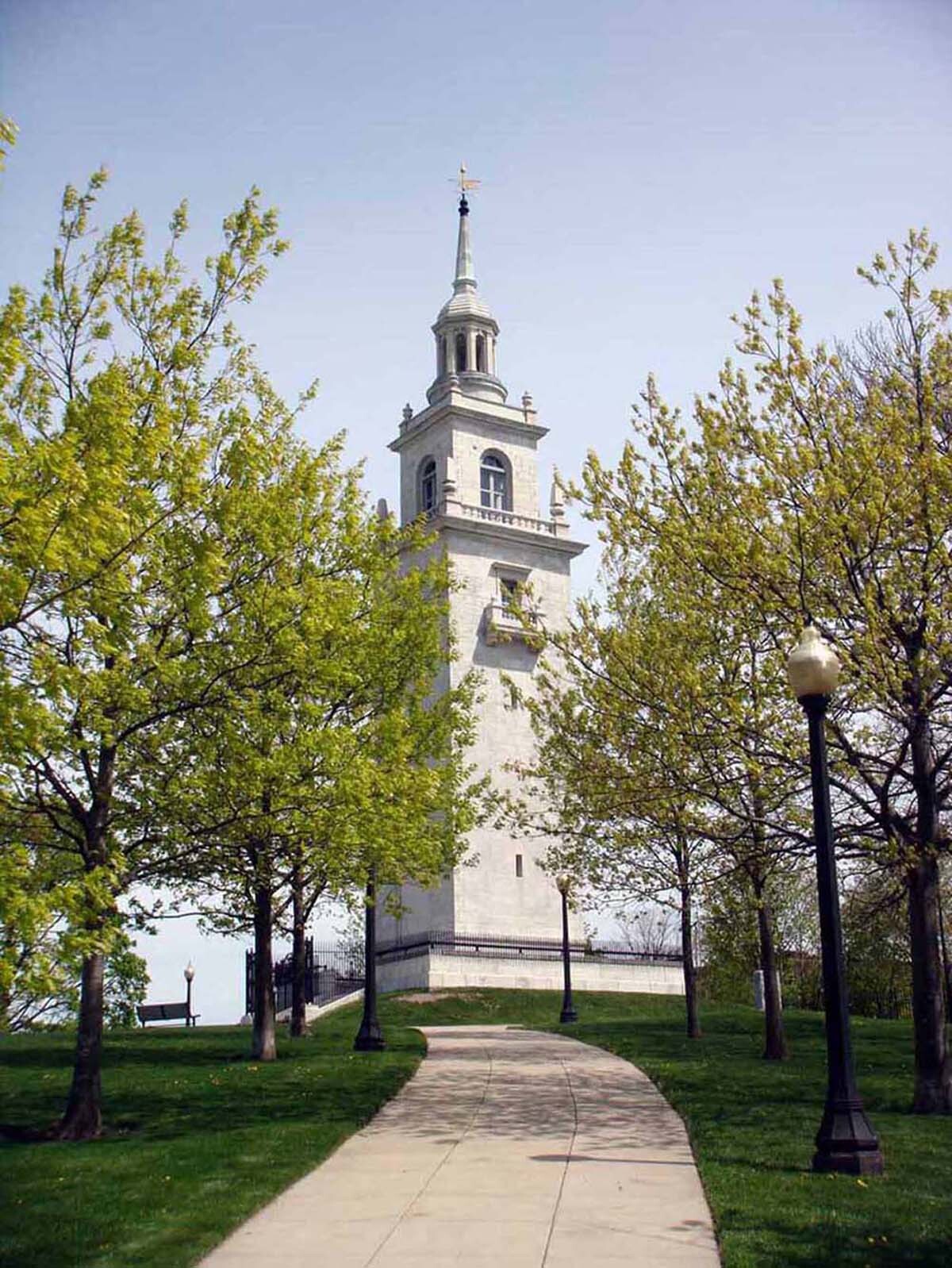 Sidewalk leading up a hill to Dorchester Height Monument. 