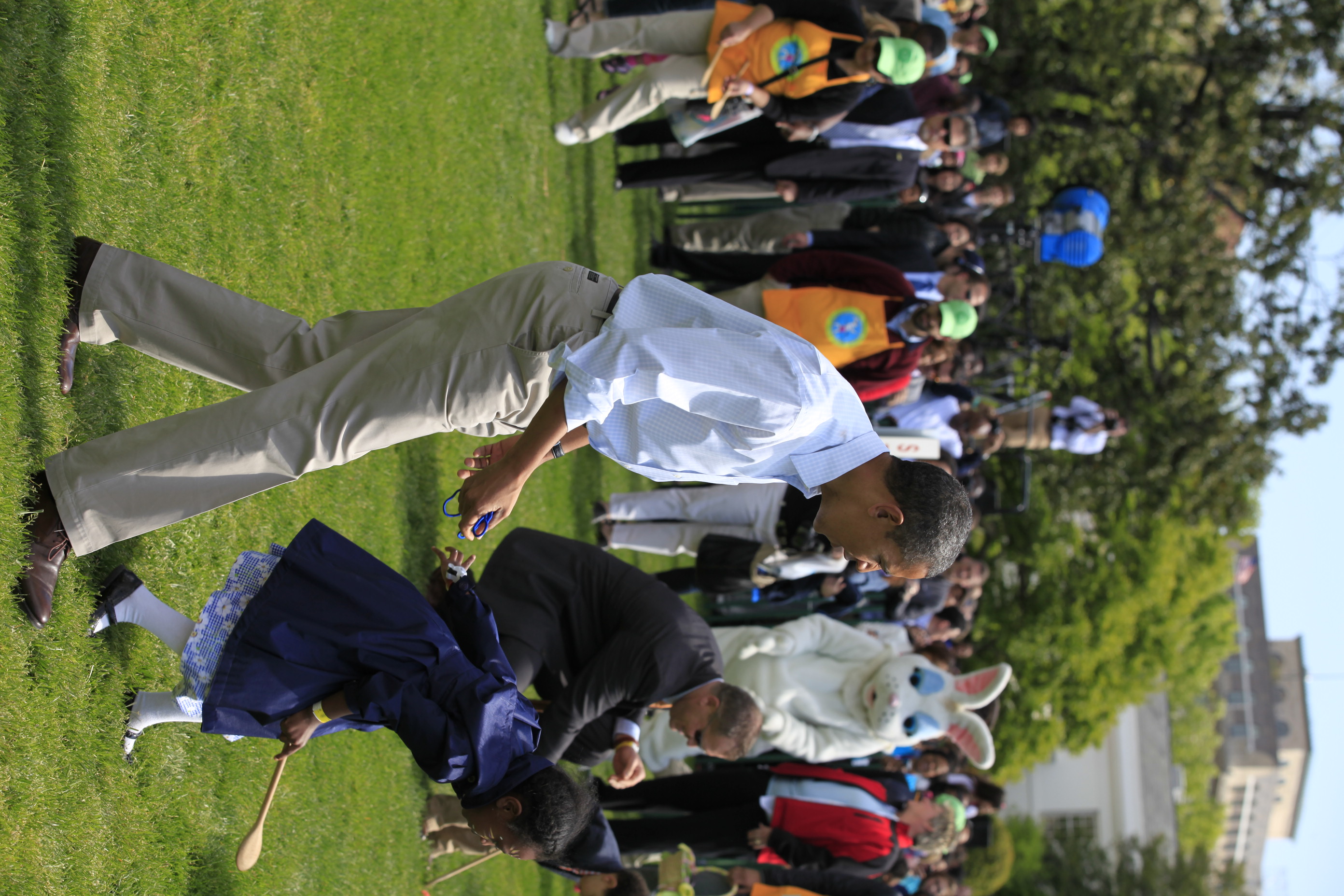 President Obama participates in the Egg Roll with children.