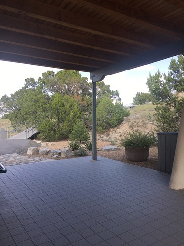 A covered porch that marks the start of the trail