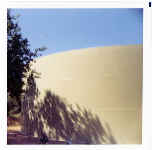 Repainting the exterior of the million gallon water tank at Birch Creek.