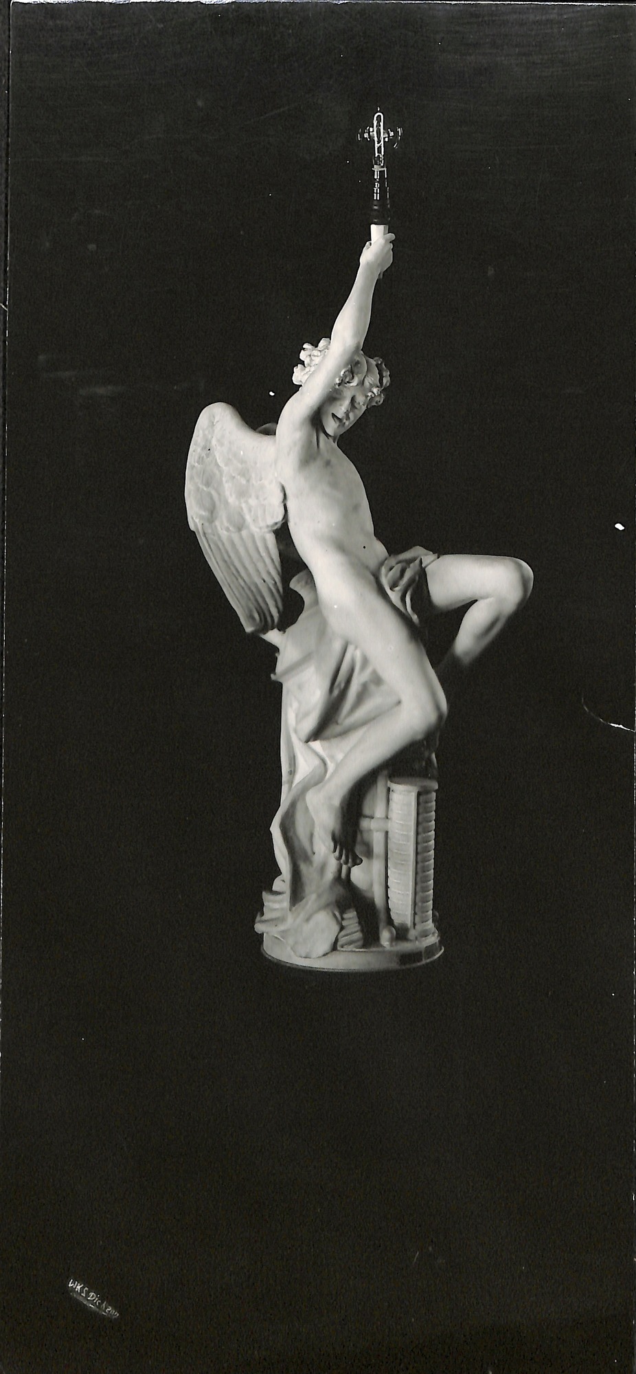 West Orange Library-- "Genius of Light" statue by A. Bordiga with original electric light bulb in its hand.