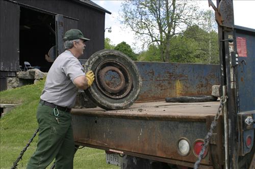 RiverDay trash clean up staff and volunteers at dumpster
