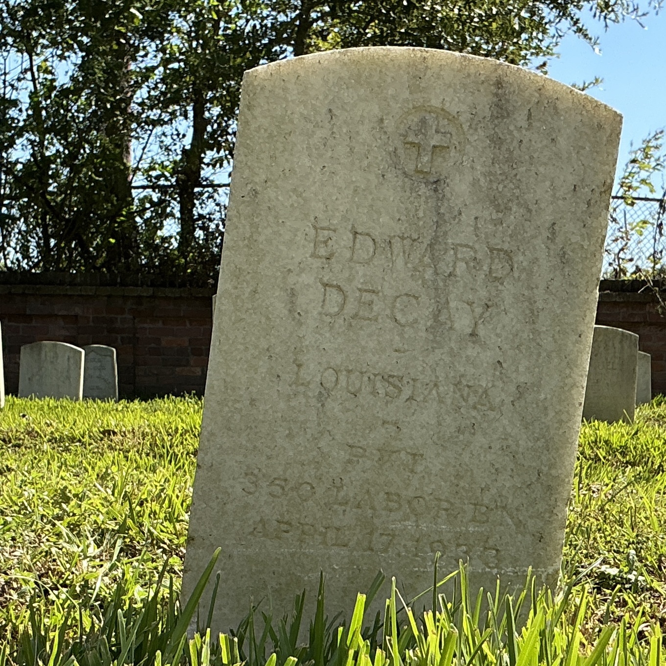 Front of upright marble headstone with flat face.