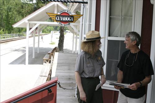 Ranger With Visitors Outside Peninsula Depot