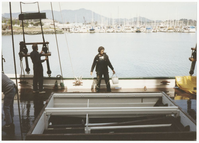 NPS staff on board Alma (built 1891; scow schooner), April 1988. Ships and Facilities Division staff member pictured working aboard Alma (built 1891; scow schooner).