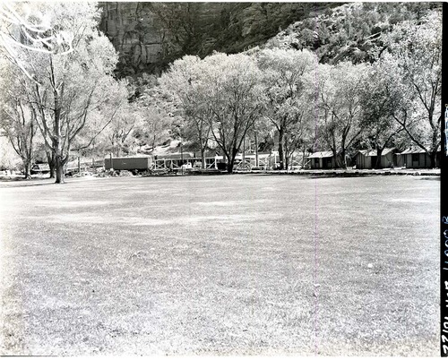 Rebuilding Zion Lodge after fire of January 28, 1966 - beginning of walls and beams of recreation hall.