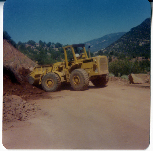 Excavator clearing road for road work/repair in Kolob Canyon.