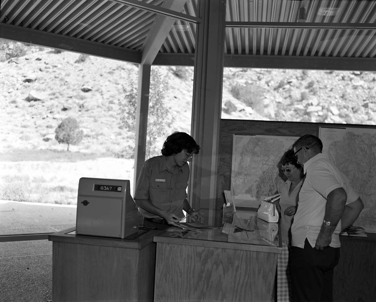 Student Conservation Association (SCA) volunteers, Richard Freeman in Visitor Center.