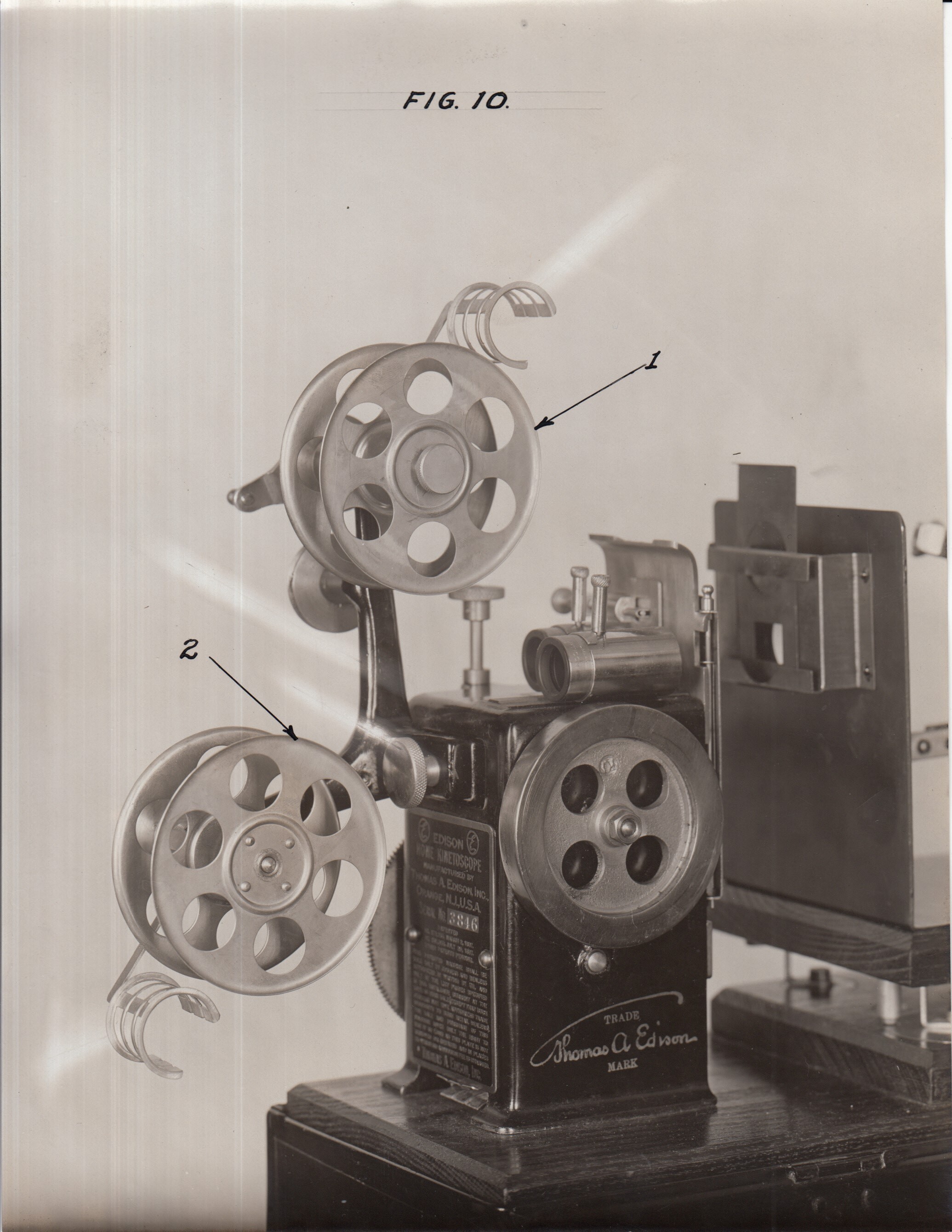 Edison home projecting kinetoscope, reels.