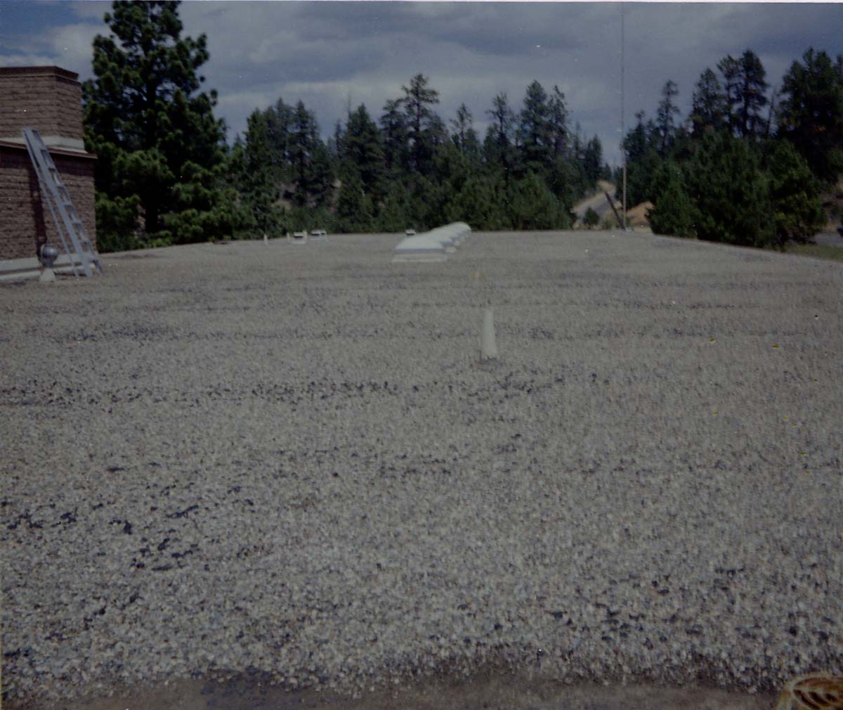 New layer of gravel spread during reroofing project. Bryce Canyon National Park.