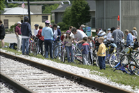 Cuyahoga Valley Scenic Railroad, Bikers Waiting to Board Train. In 2007 CVSR and NPS launched Bike Aboard!service to encourage use of the railroad as alternative transportation. For a $2 fare cyclists can ride the train in one direction and bike the other along the Ohio & Erie Canal Towpath Trail. Some images are at Rockside Station and others in Peninsula near the Peninsula Depot.