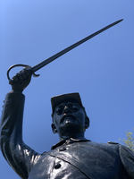 soldier after restoration with arm raised holding sword