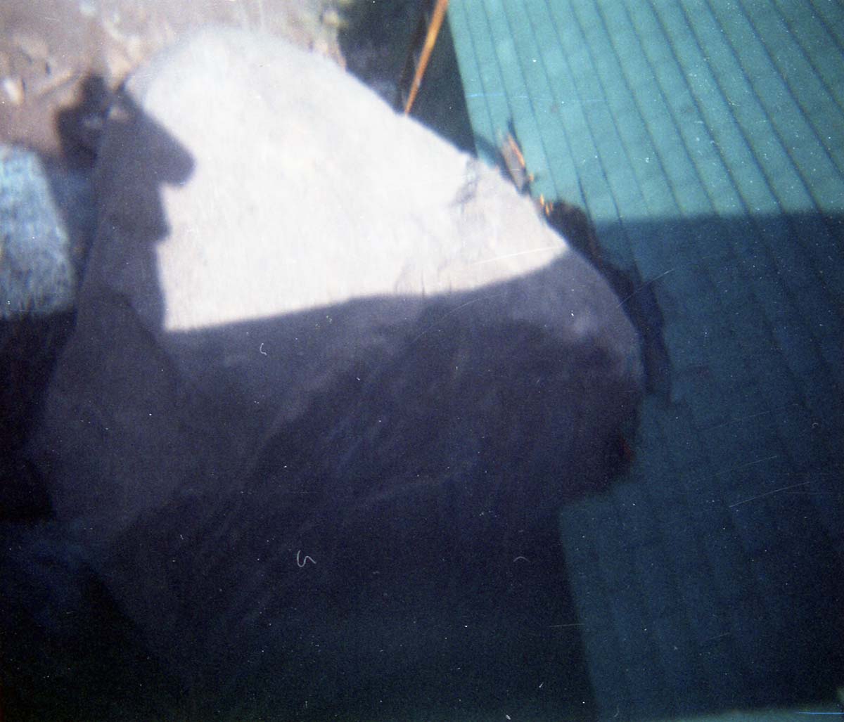 Color photo of rock slide in maintenance yard.