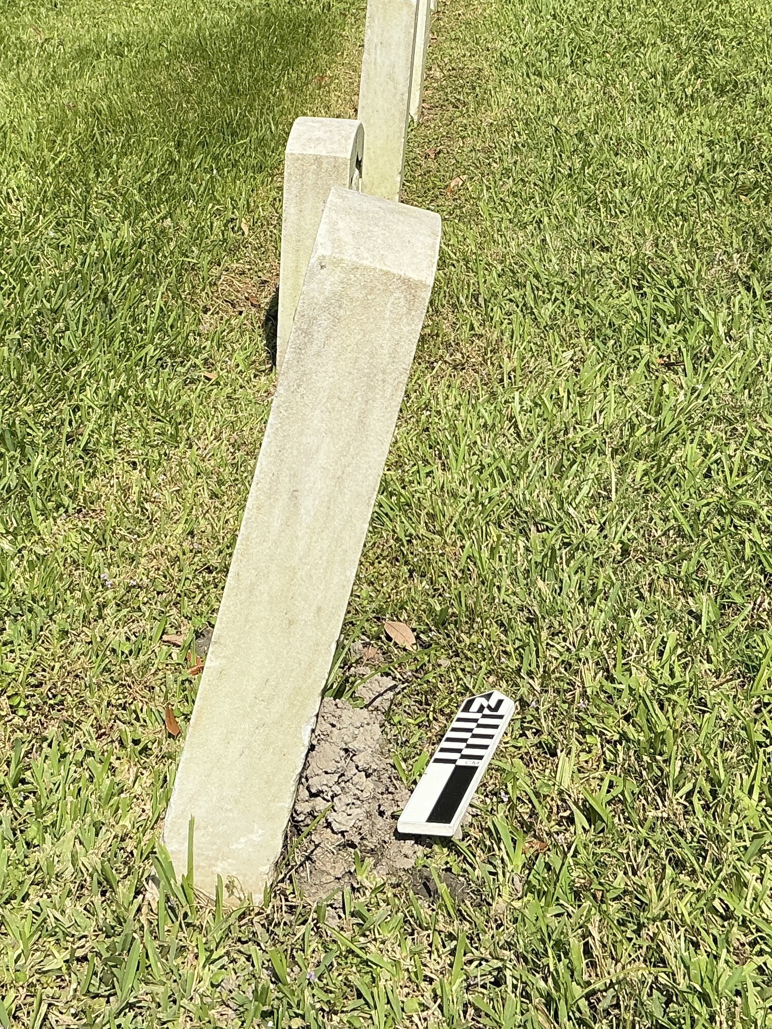 Extra image of historic upright marble headstone with recessed shield face.