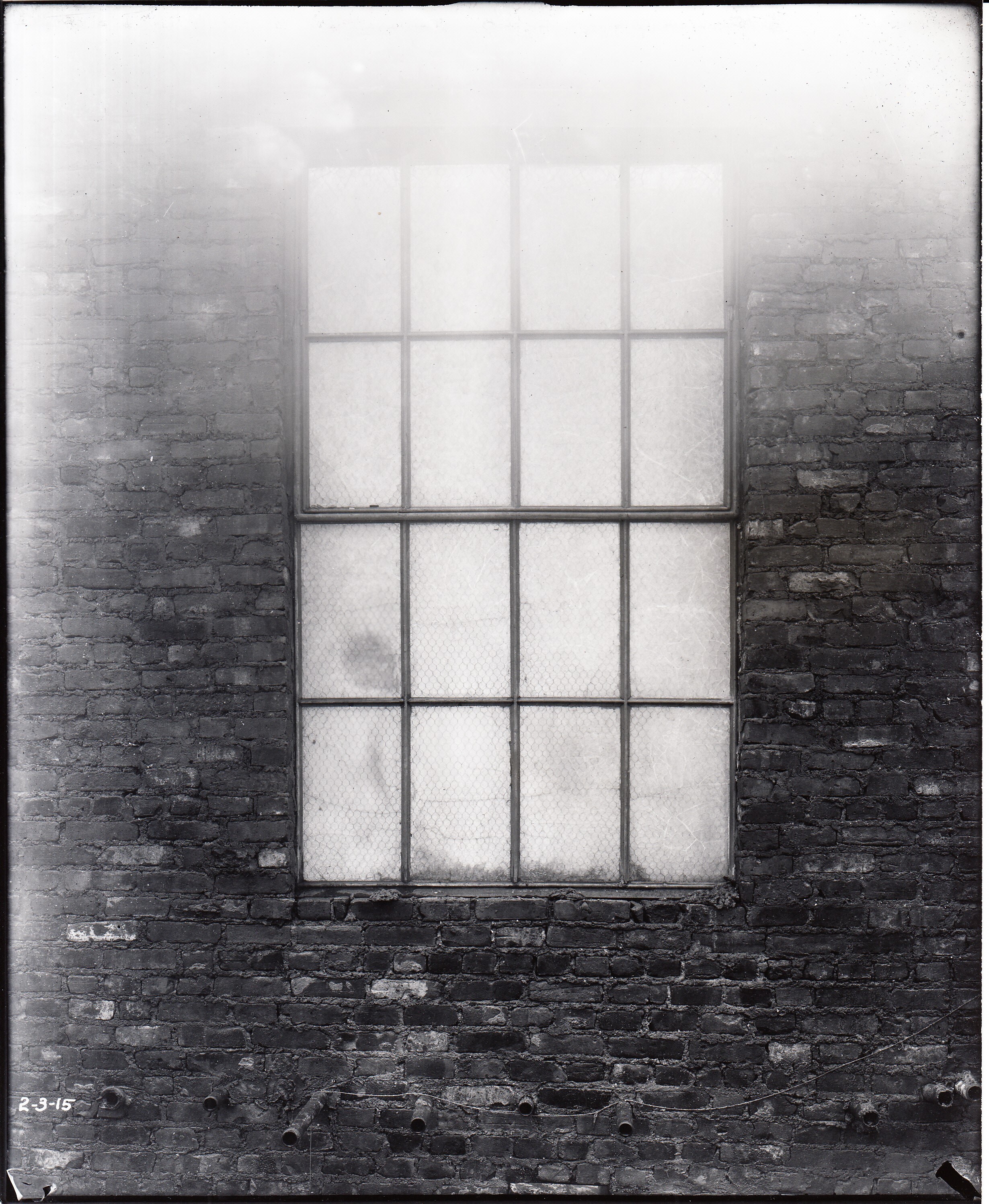 Specially constructed chimney for testing two kinds of wire- glass windows with steel frames and sash, window after test.