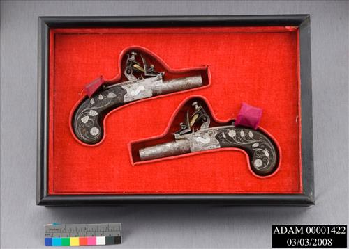 Pair of Travelling Flintlock Pistols with Inlaid Stock of Silver from the Adams National Historical Park Collection