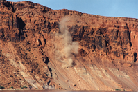 Photograph of a cloud of dust from a rockfall. 