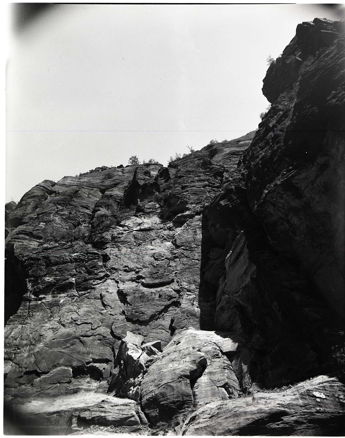 BW photo of a rock slide along the Narrows Trail.