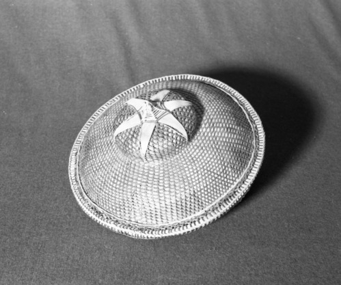 Marie Rozier Collection, Catalog No. A-6. Object: Philippine hat. Dimensions: 13 x 5". Materials: Ti leaves, other unidentified materials. Collection History: From H. Volkmann. Photographed by Michael Dixon in December 1982. Catalogued by Craig Bates and Barbara Beroza. Yosemite Collections, National Park Service.