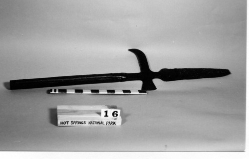 Halberd, Spanish, supposed artifact of DeSoto expedition through Arkansas; iron head, wooden handle banded in iron; head has spear-like point on end (with broken tip), small ax blade on one side, curved hook on opposite side; accompanied by image of John Fordyce drawing of original, sent to HOSP by Dr. Anne Early, Arkansas State Archeologist, in October 2011 (original drawing in archives at University of Arkansas - Fayetteville). Curator's Notes from 8/7/2014 and 10/15/2014: Halberd has been examined by Dr. Jeffrey Michem of AAS and determined likely to be an actual weapon from the DeSoto expedition and Spanish in origin.