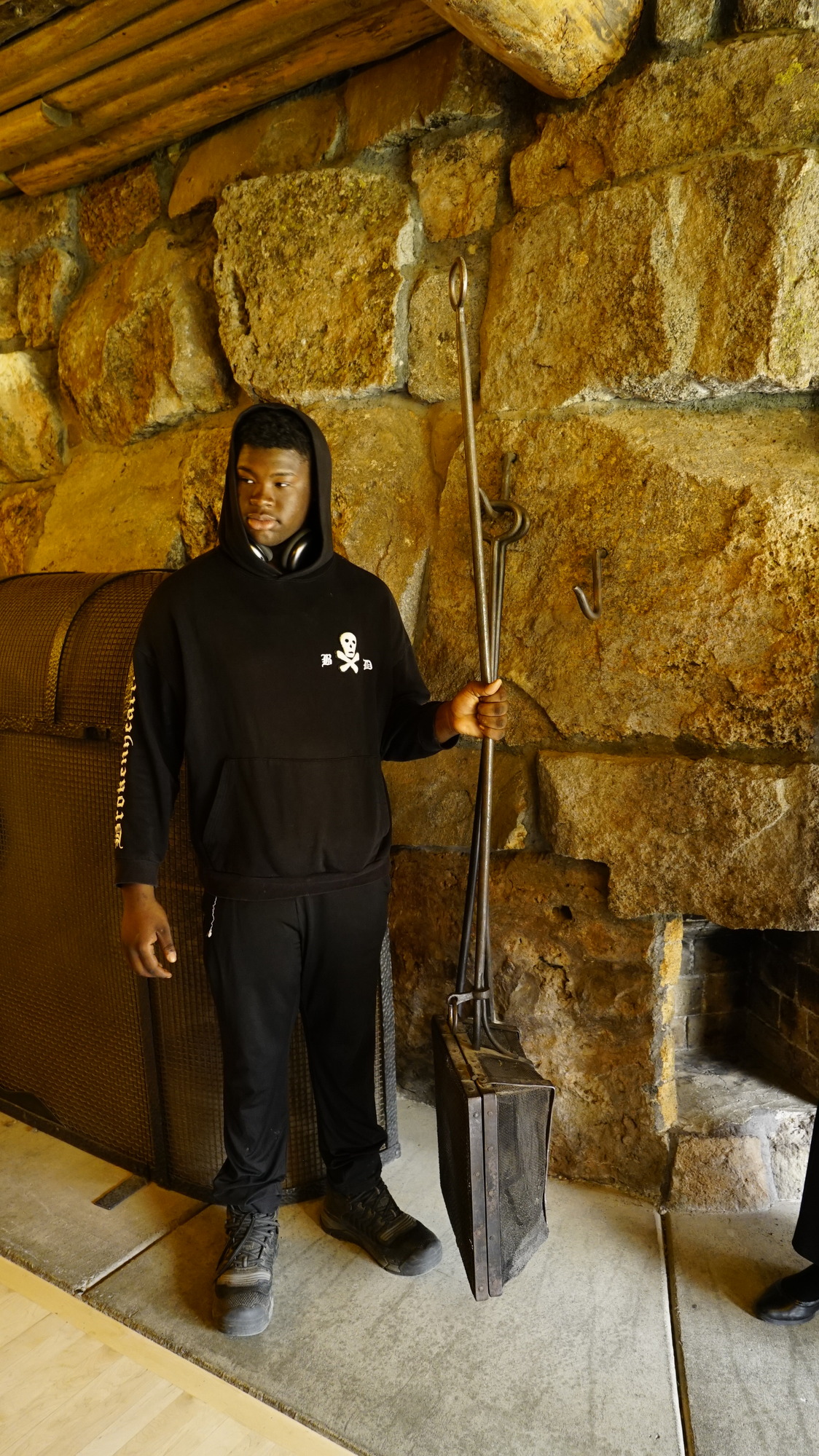 Man picking up old tool