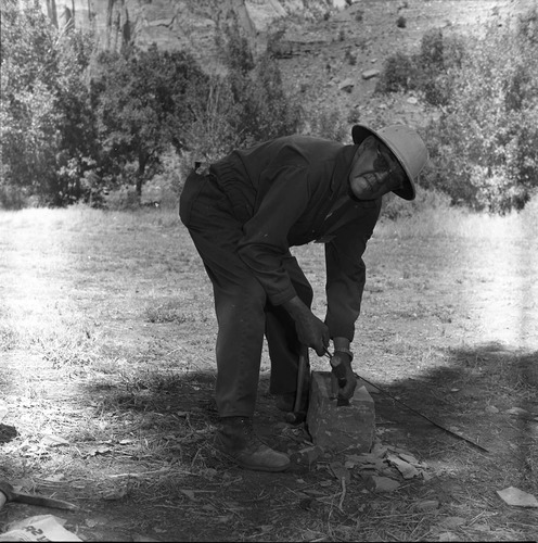 Sheldon Olsen demonstrates stone cutting and rock work. Second annual Folklife Festival, Zion National Park Nature Center on September 1978.