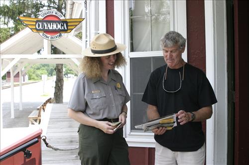 Ranger With Visitors Outside Peninsula Depot