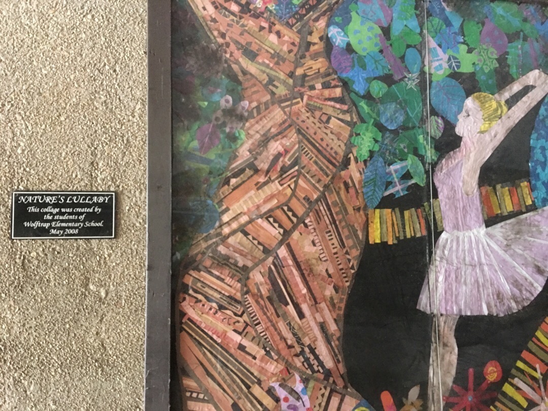 A mural of a dancing ballerina titled "Nature's Lullaby" inside the pedestrian tunnel leading to Wolf Trap