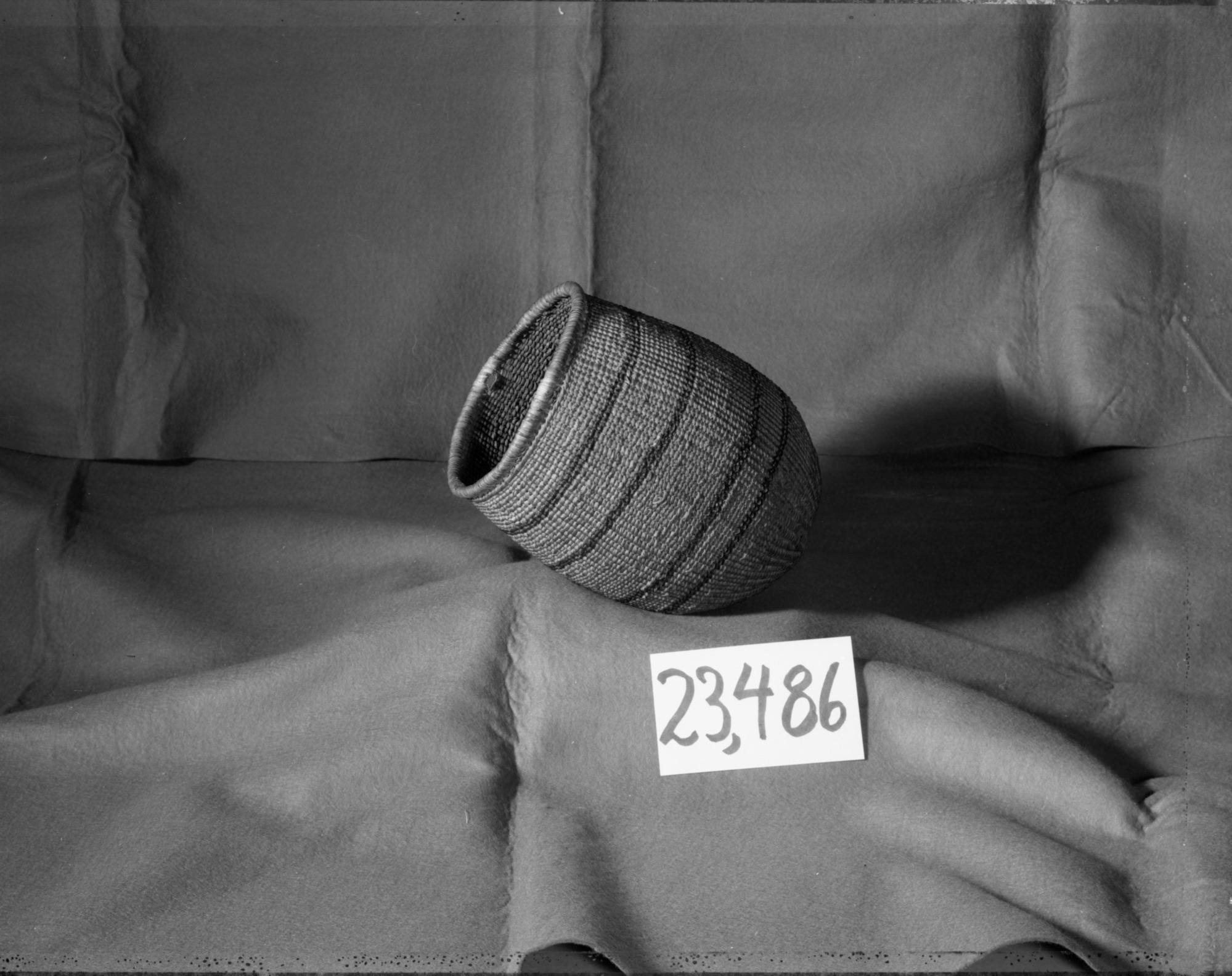 Wukchumne Yokuts berry basket. Made by Ida (Maggie) Ichow from the Frank Latta collection. Made of sedge root & split redbud shoots. In the YNP Collections - Cat no. 23,486.