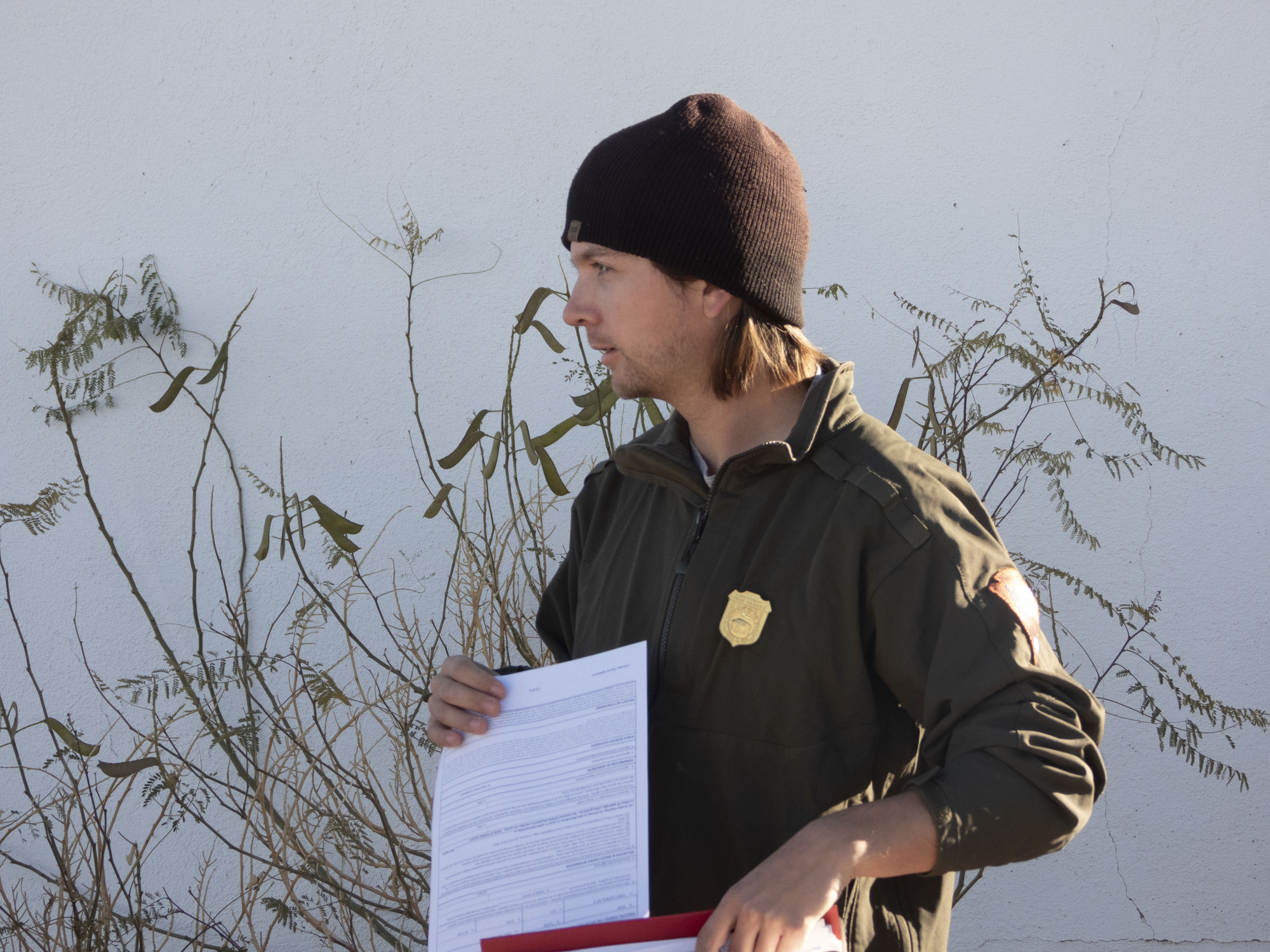 Ranger Ryan instructing volunteers for the Cima Dome Joshua tree restoration project.