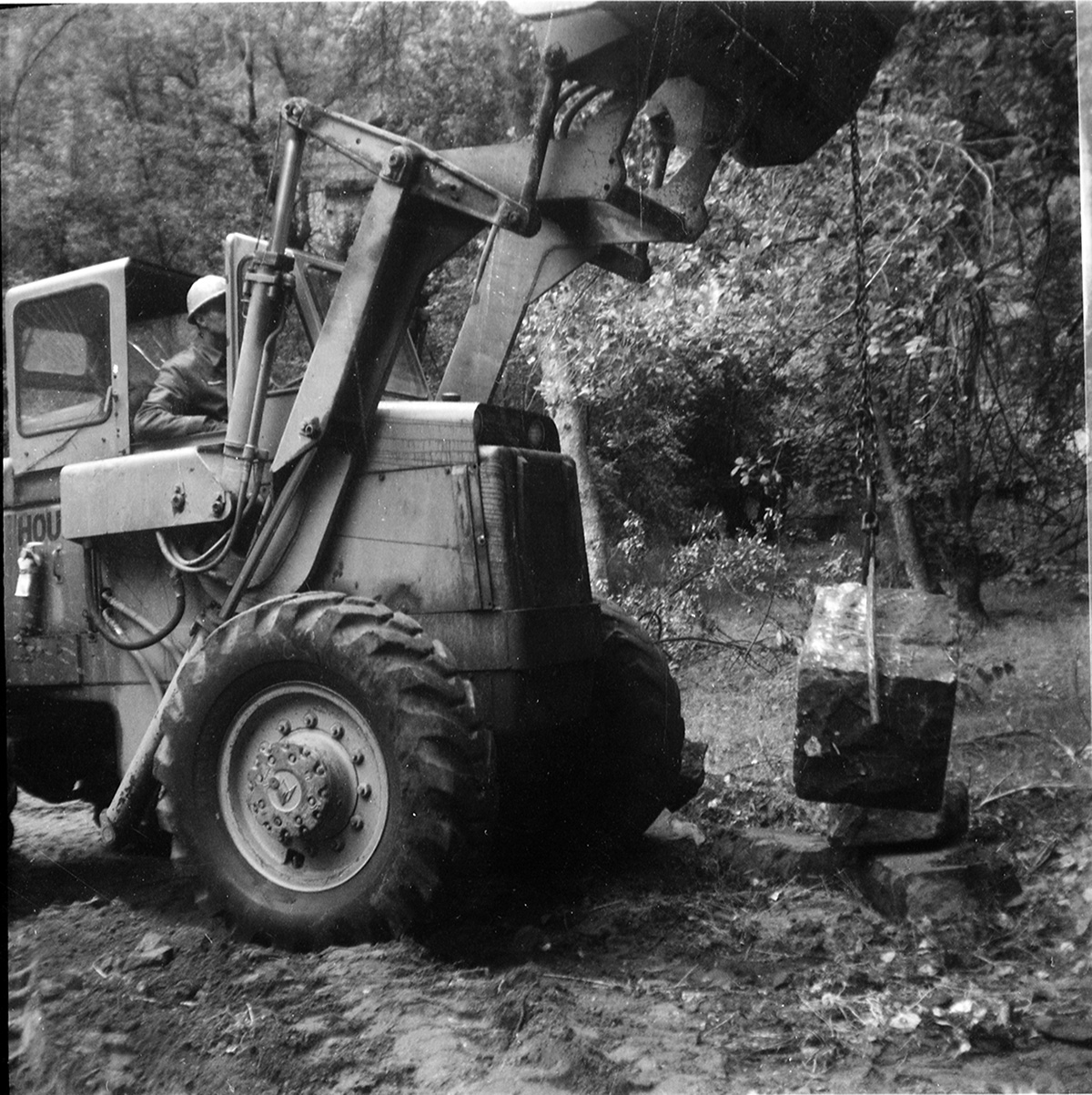 Tractor hauling rocks used for road work along the scenic canyon drive near the Grotto.
