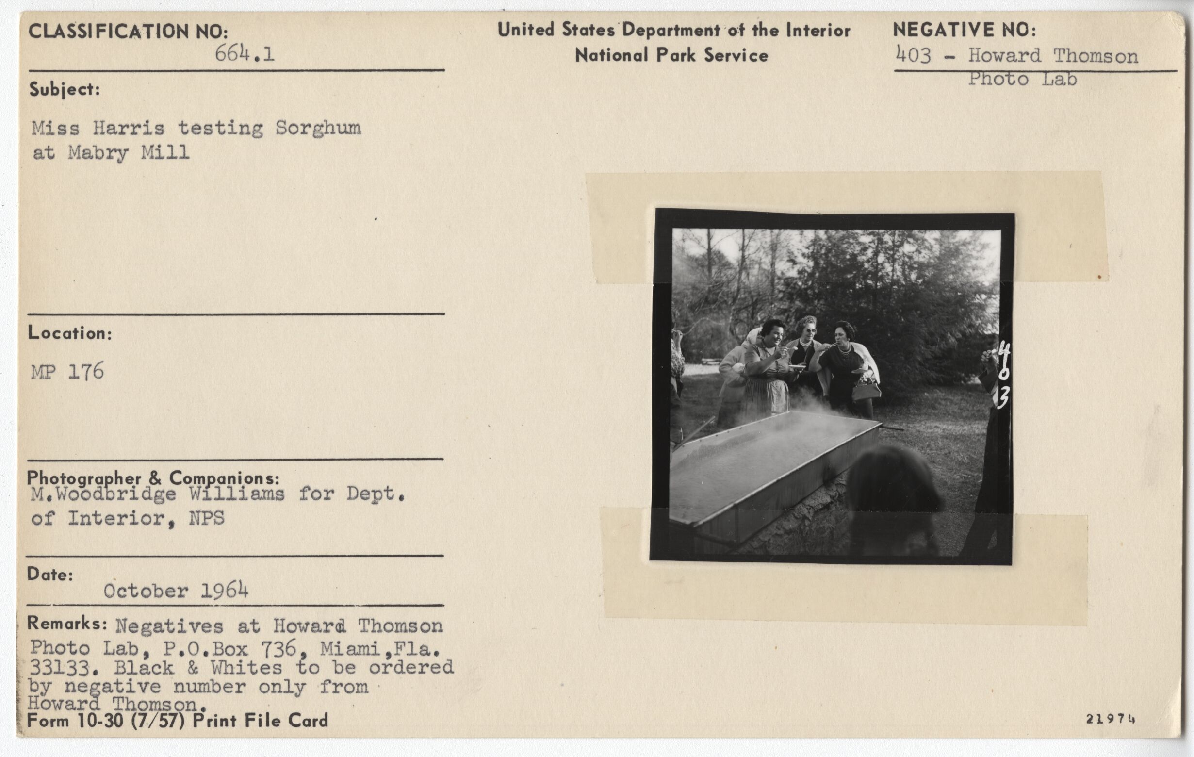 Miss Harris testing sorghum at Mabry Mill