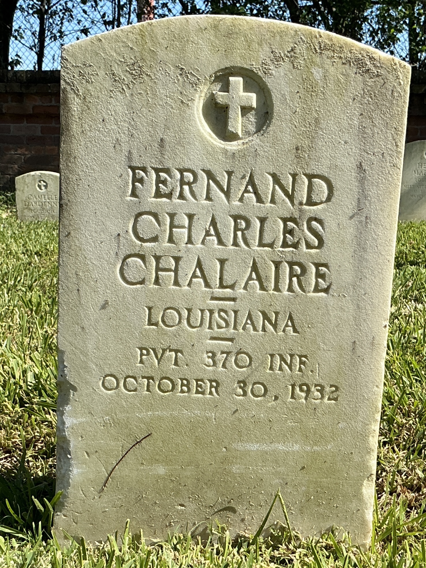 Front of upright marble headstone with flat face.