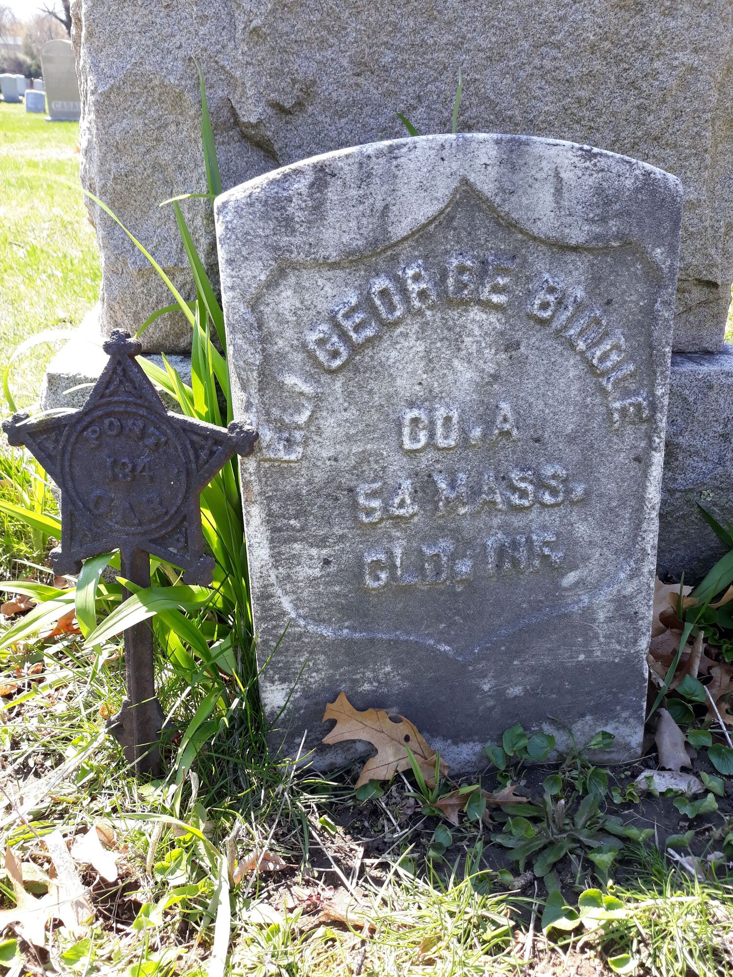A gravestone that read Eli George Biddle. Co.A. 54 Mass.