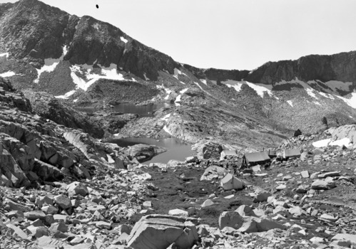 Trail camp near lake. Note two lakes on different levels in background. Turquoise & jade in color.