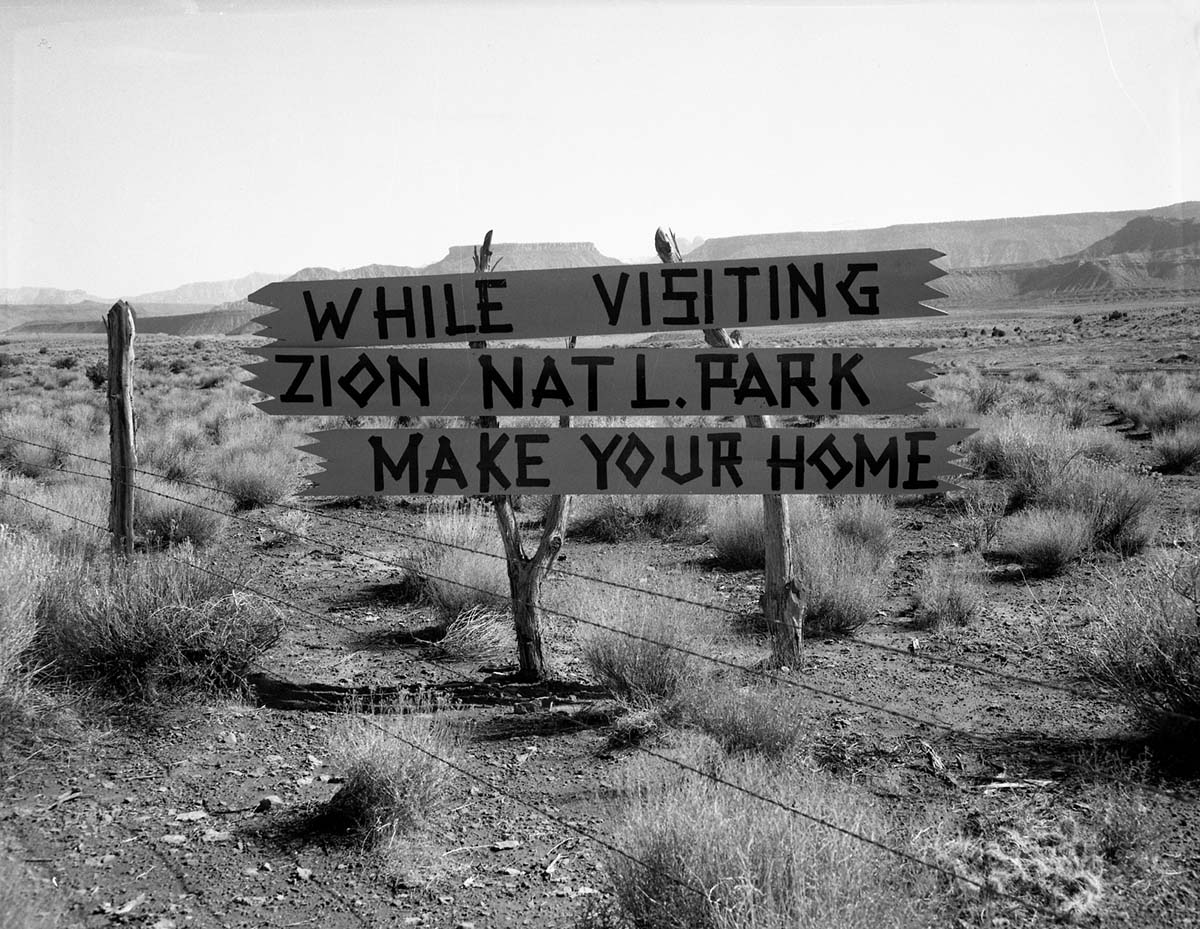 The Grandma's signs on Utah State Route 15 (now State Route 9), the black on yellow signs were at almost every turn from below Virgin, Utah to Zion National Park. These photos were taken as documentation to the proposed clean up project to remove undesirable signs and debris on the route to Zion. This is a view from west of the town of Virgin, Utah looking north, West Temple in the distance (left) and Rockville Mountain (right).