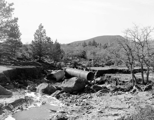 Flood damage - washed out culvert and portion of road near Maloney Hill.