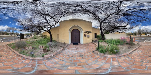 360 panoramic photo of visitor center front entrance with ornate doors and scallop shell motif