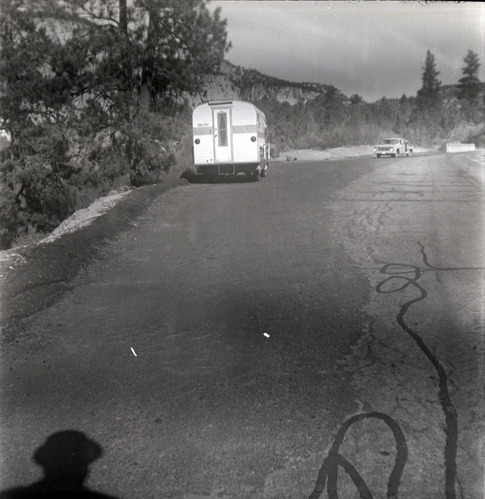 Trailer pulled over on turn out during east side road repair and turn out construction.